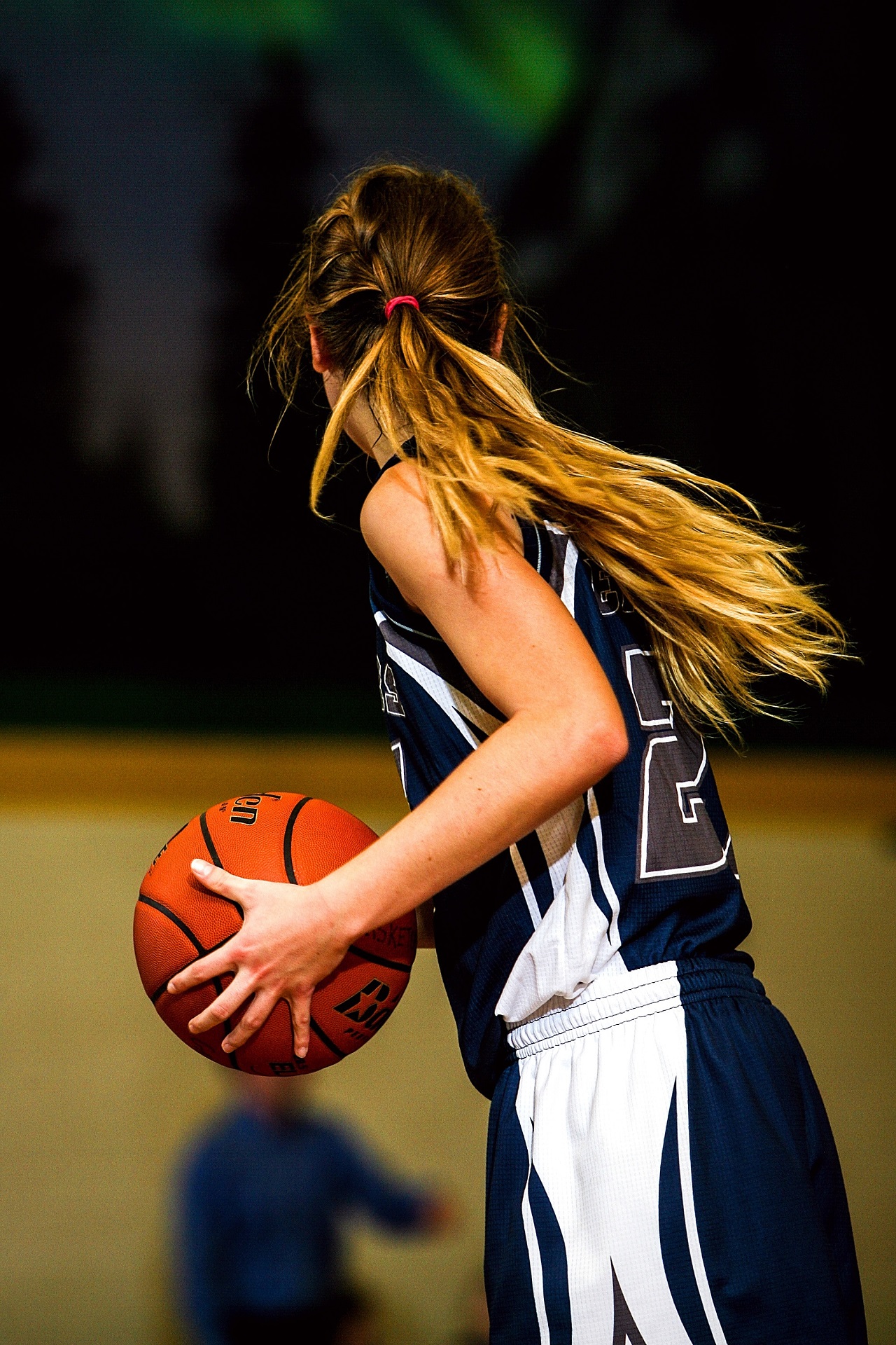 Image of athletic female basketball player